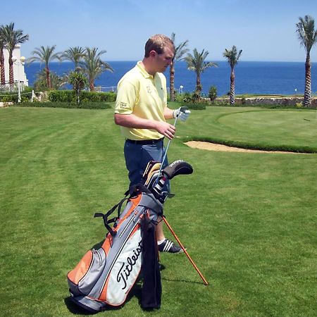 Stella Di Mare Beach Hotel & Spa Sharm el-Sheikh Luaran gambar Golf player with a golf bag