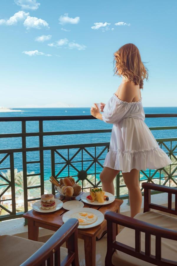 Stella Di Mare Beach Hotel & Spa Sharm el-Sheikh Luaran gambar A woman wearing a sun dress